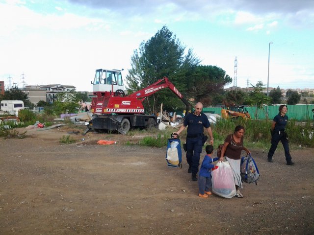 Roma families are forcibly evicted from the Via Salviati camp in Rome, Italy
